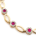 10CT YELLOW GOLD 19CM SYNTHETIC RUBIES & DIAMOND BRACELET