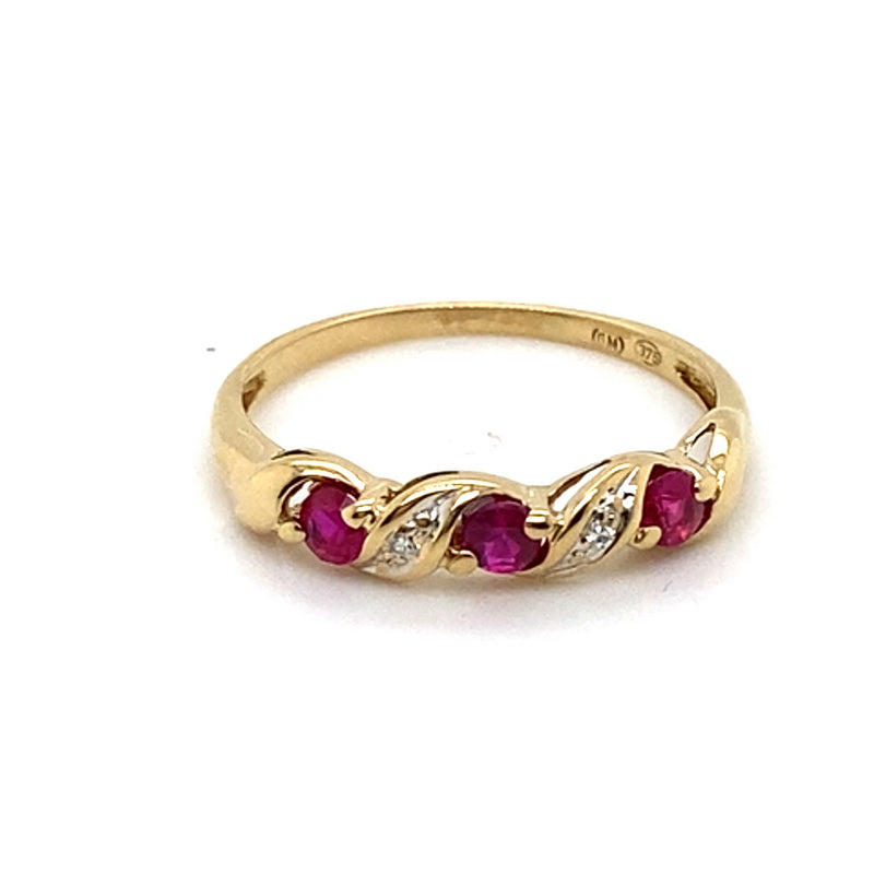 9CT YELLOW GOLD SYNTHETIC RUBIES & DIAMOND CROSS OVER PATTERN DRESS RING