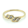 9CT YELLOW GOLD CUBIC ZIRCONIAS CHANNEL SET IN THE CROSS OVER RING