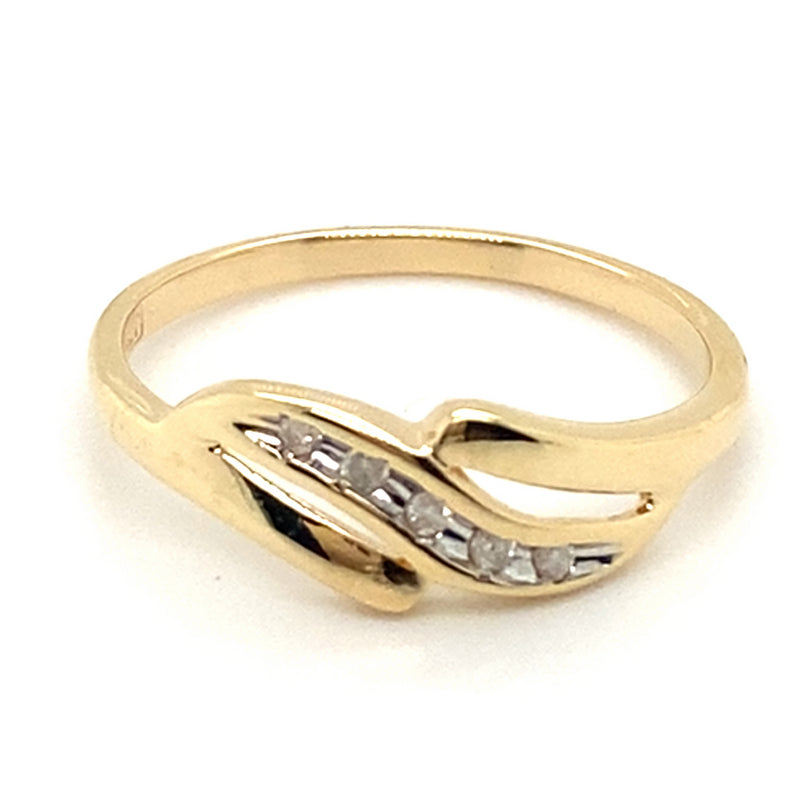 9CT YELLOW GOLD DIAMONDS SET IN CROSS OVER WAVE DRESS RING