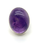 OVAL CABOCHON CUT AMETHYST BEZEL SET IN SILVER RING