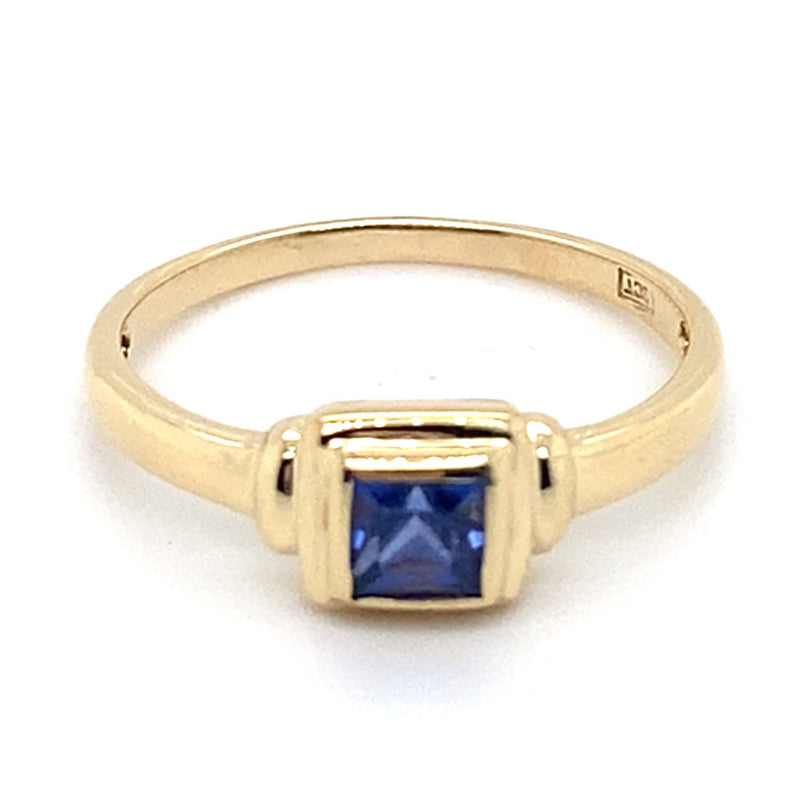 9CT YELLOW GOLD BEZEL SET SYNTHETIC SAPPHIRE DRESS RING