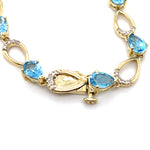 9CT YELLOW GOLD 19CM TOPAZ & DIAMOND TENNIS STYLE BRACELET VALUED @ $1999