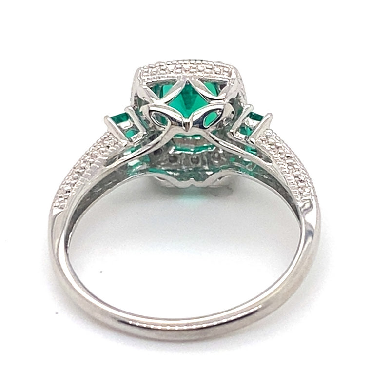 9CT WHITE GOLD SYNTHETIC EMERALD SURROUNDED BY DIAMONDS DRESS RING