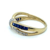 9CT YELLOW GOLD CROSS OVER DIAMOND & SAPPHIRE DRESS RING VALUED @ $1399