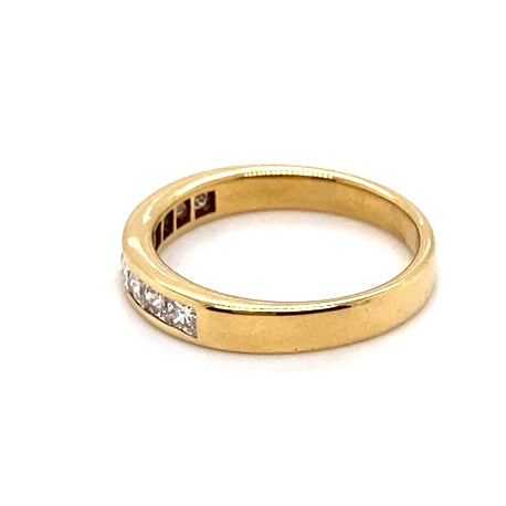 18CT YELLOW GOLD CHANNEL SET DIAMOND DRESS RING VALUED @ $3399