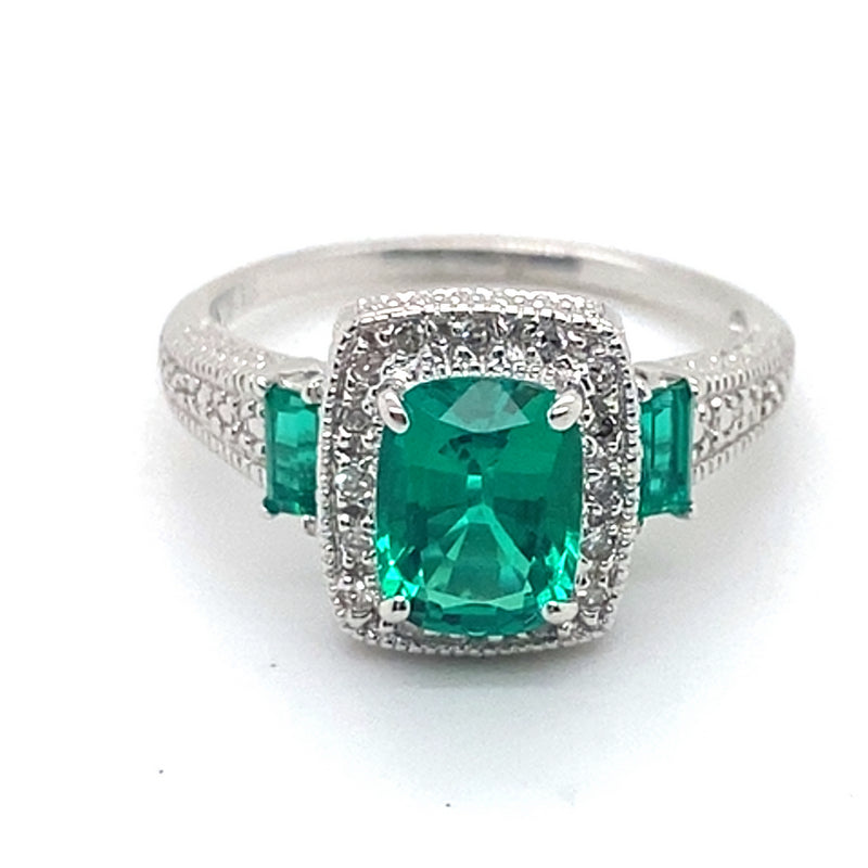 9CT WHITE GOLD SYNTHETIC EMERALD SURROUNDED BY DIAMONDS DRESS RING