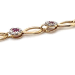 10CT YELLOW GOLD 19CM SYNTHETIC RUBIES & DIAMOND BRACELET