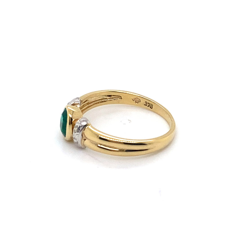 9CT YELLOW GOLD BEZEL SET OVAL SYNTHETIC EMERALD & DIAMOND DRESS RING