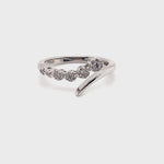 10CT WHITE GOLD OPEN CROSS OVER PATTERN DIAMOND DRESS RING VALUED @ $1099